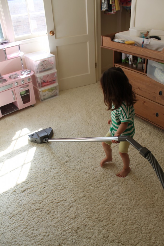 Lydia helped me vacuum her room! 