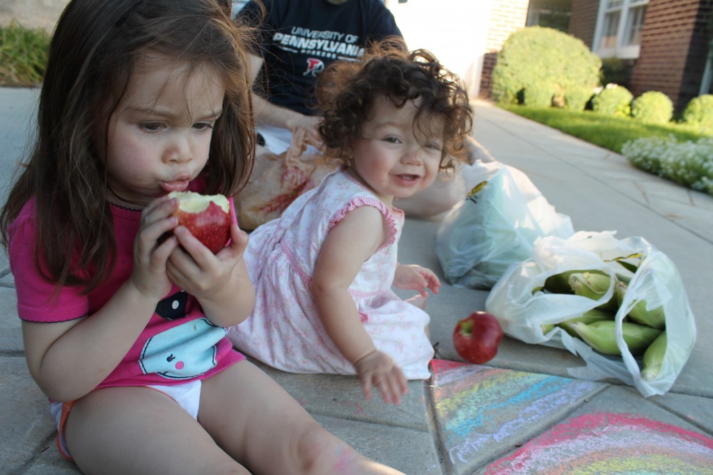 Eating apples, shucking corn, and playing chalk on the driveway. We loved our lives tonight.