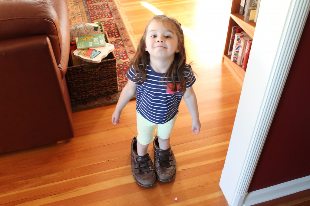 Lydia tried on Abe's shoes. 