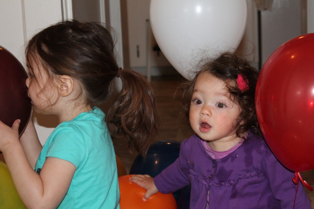 post breakfast balloon play. It felt like so much had happened by the time the girls were finally loaded into the stroller that I wished our neighbor a "good afternoon" at 9am. Oops!