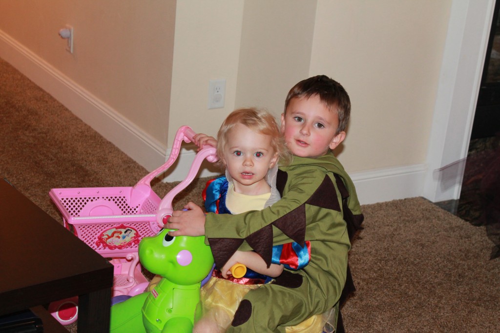 We had a Halloween party at preschool today. Here's a cute shot of a friendly green dragon cuddling up to Snow White.