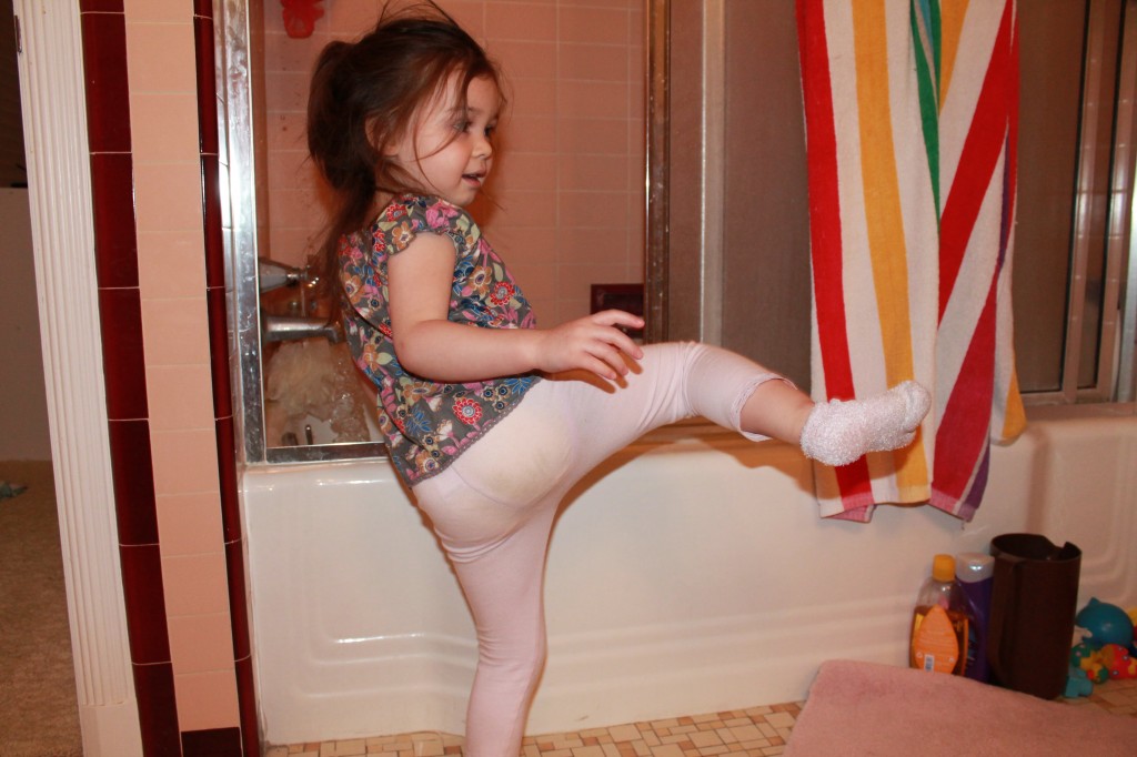 Here's Lydia showing Mary how to climb in the bathtub.