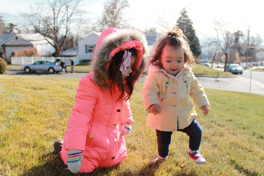 It was nice out today, so we spent some time outside. The girls did not need to be this bundled, but Lydia insisted on wearing her puffy coat. She also claimed that the hood kept her cool.