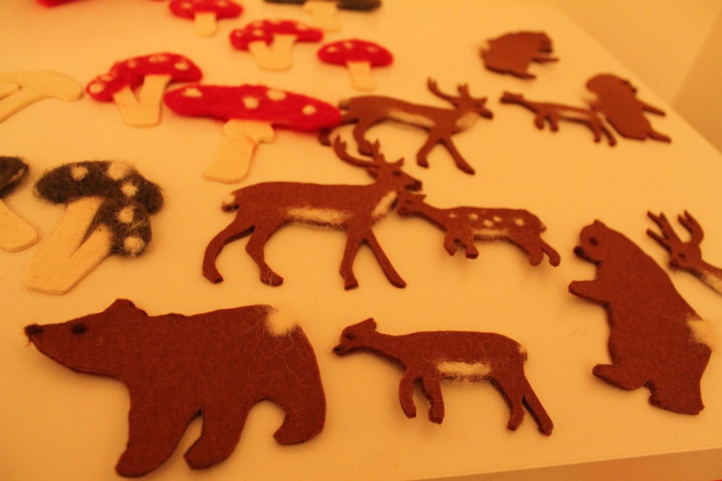 Here are some of the ornaments I traced, cut out, and felted. Aren't they so fun?