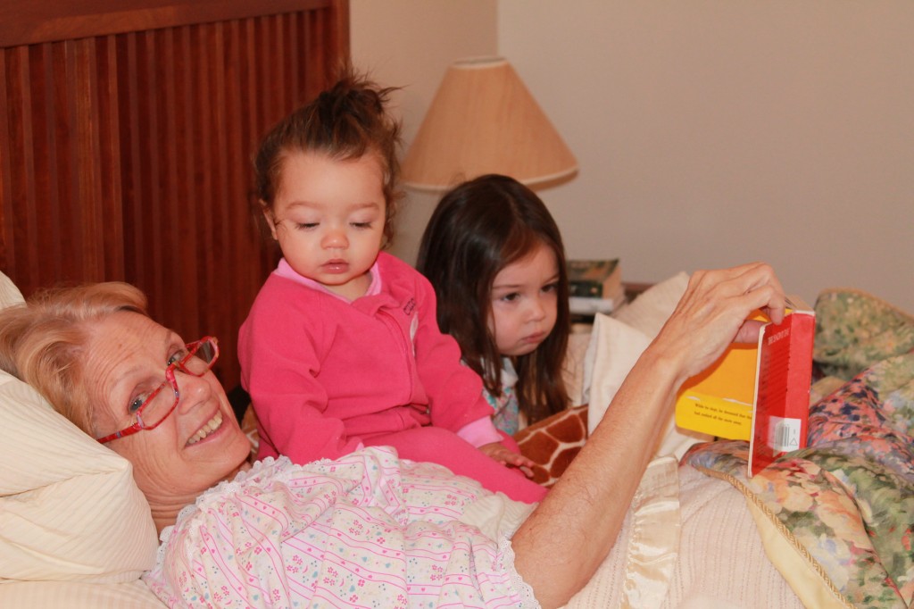 The girls started the day in bed with Nana reading books.