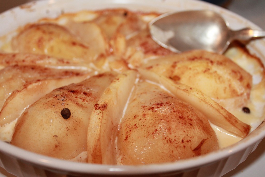 I baked pears again. They are so easy! I just peeled them, put them in a buttered pan, sprinkled some cinnamon and allspice cloves on top, and put them in a 400 degree oven for 15 minutes. Then I poured some cream over them and baked for 20 more minutes. We paired these with Argentine Caramel ice cream, and voila! Yesterday's brunch food became today's dessert!