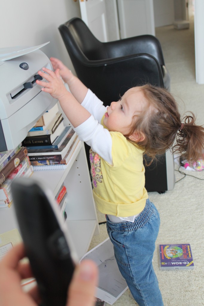 She tried to show Nana how the printer has this funny piece of plastic that moves when you touch it.