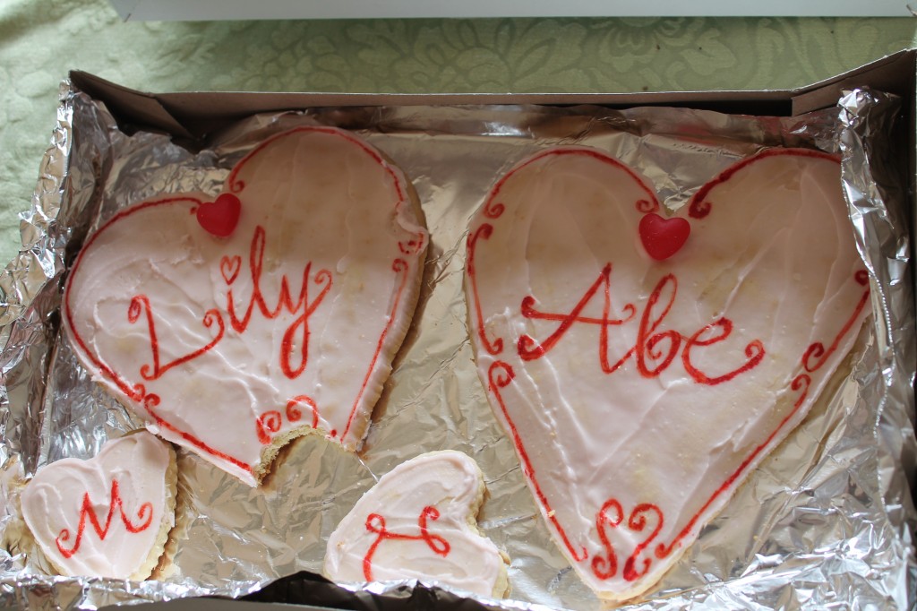 Abe's aunt, Christina, sent us some Valentine's cookies. I took a bite of mine before I realized that my camera was literally right in front of me. The cookies deserved a photo, don't you think?