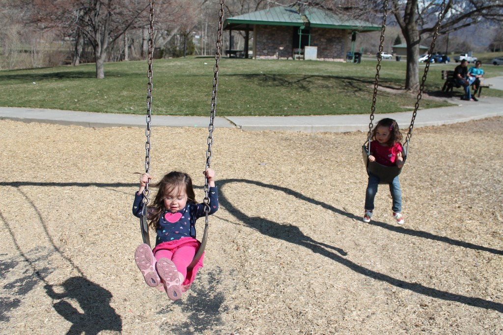 I took these pictures of the girls swinging right before I gave Lydia a push that accidentally knocked her off the swing. We were both traumatized, but thankfully she was fine. I proposed driving home for a cupcake break, and that seemed to solve the problem.