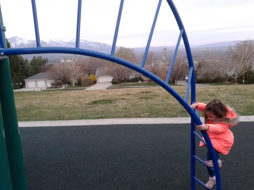 Lydia looked at the bars and said, "I know I can do this!" That's probably because of our coaching session at the park two days ago. Alas, these bars surpassed her current abilities.