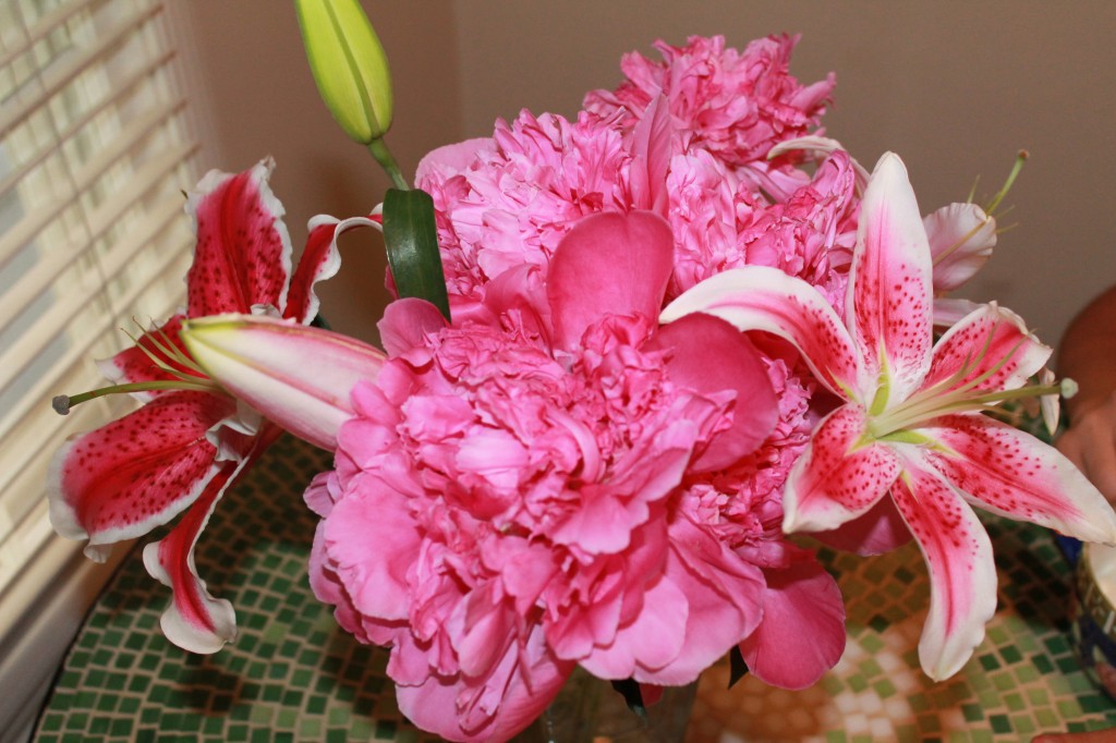 The anniversary bouquet is blooming! My two favorite flowers--peonies and tiger lilies. The smell is happy.