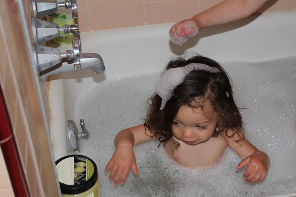 Lydia loved making Mary's hair white with bubbles.