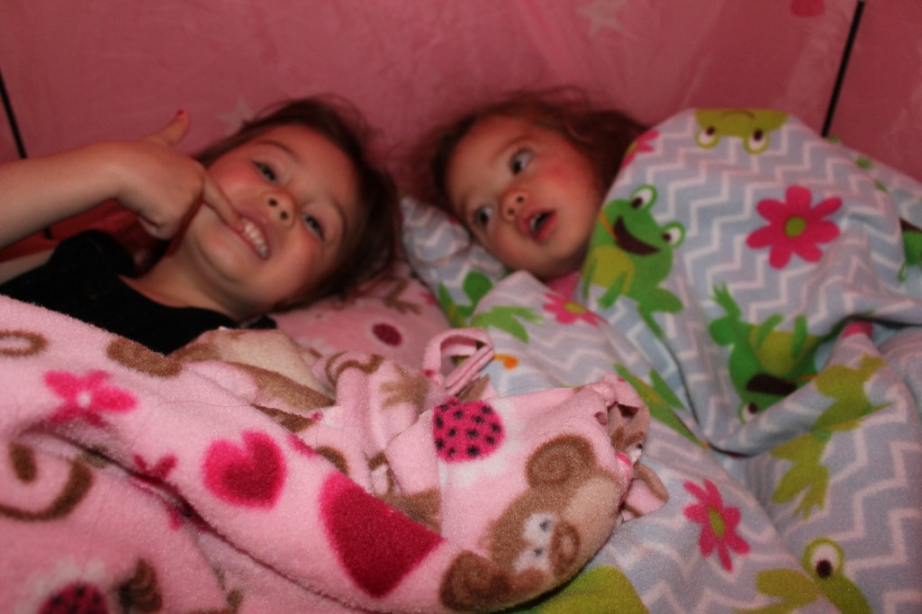 The girls woke up and wanted to build a nest for themselves in their princess tent. They had a blast.