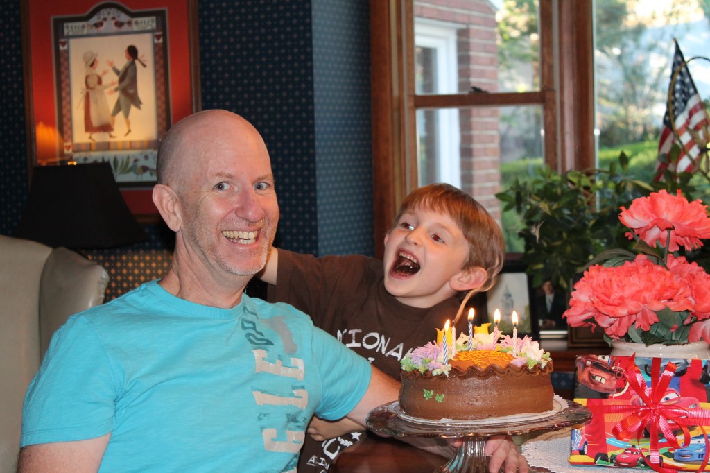 It was Steve's birthday, too. Henry helped blow out the candles.