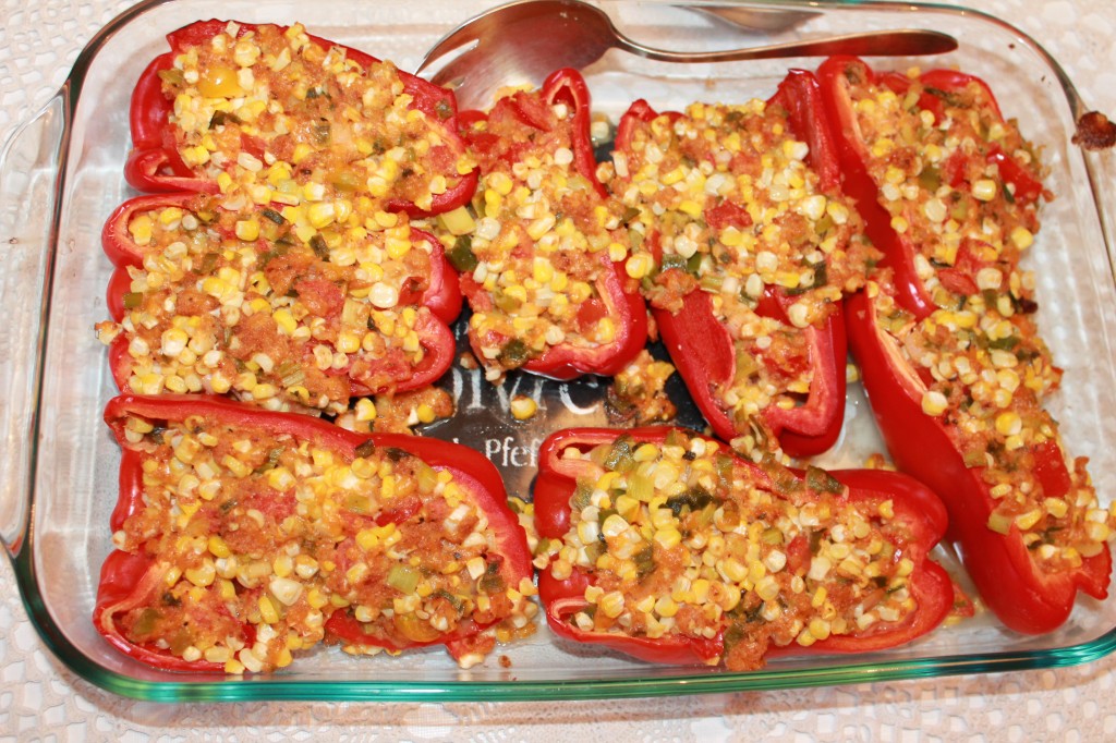 I stuffed peppers with some of that market corn, market tomatoes, scallions, cheddar, and homemade bread crumbs. They look messy, but they were really yummy.