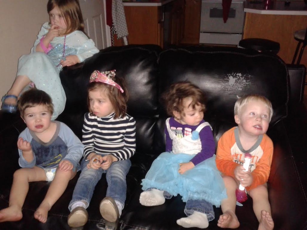 We spent the last ten minutes watching a movie. The kids were cute all lined up on the couch.