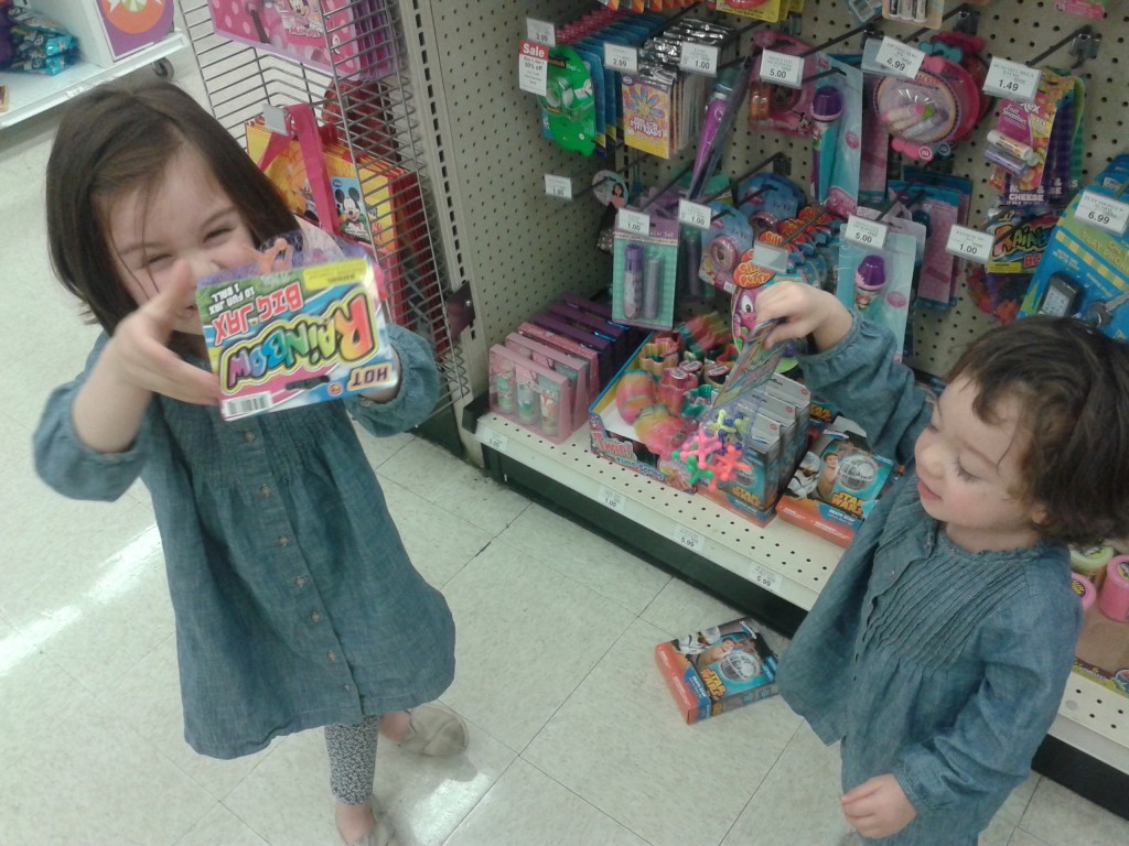 After trips to several stores, they finally found a bouncy ball! (Lydia had drawn one.) 