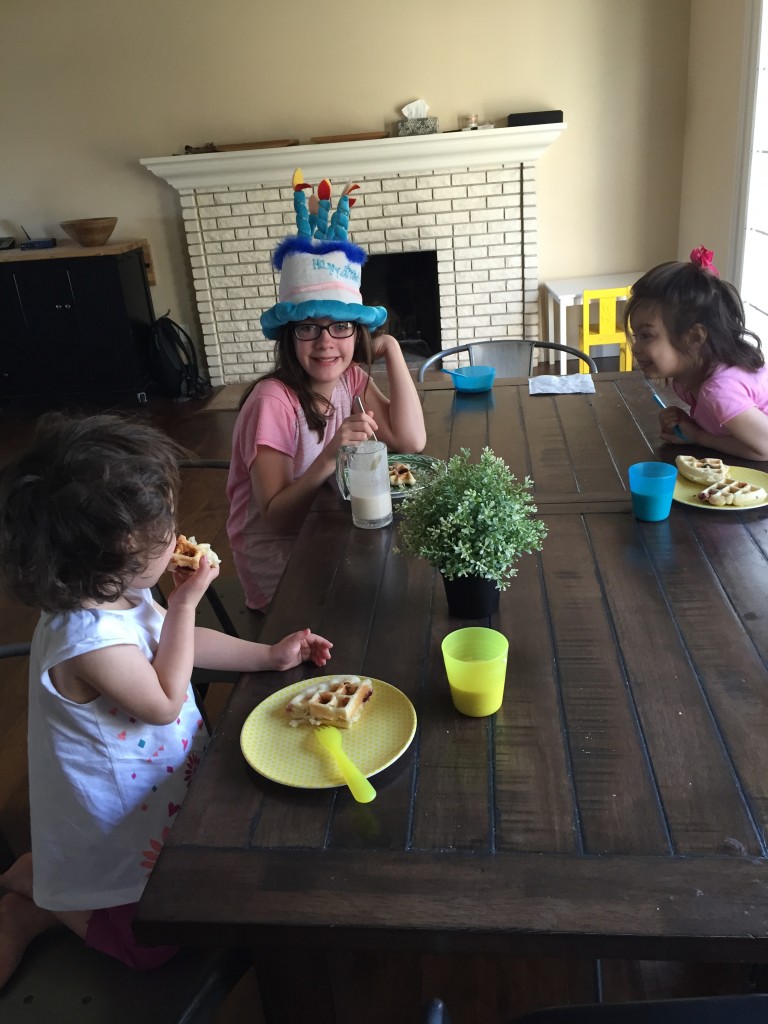 We started Isabella's birthday with cherry buttermilk waffles. She wore her birthday hat all day!