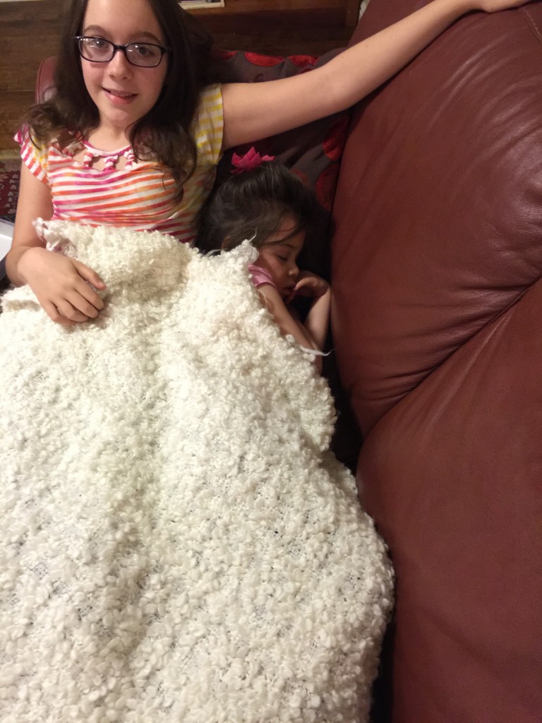We found Lydia and Isabella cuddled up on the couch. Lydia was sound asleep.
