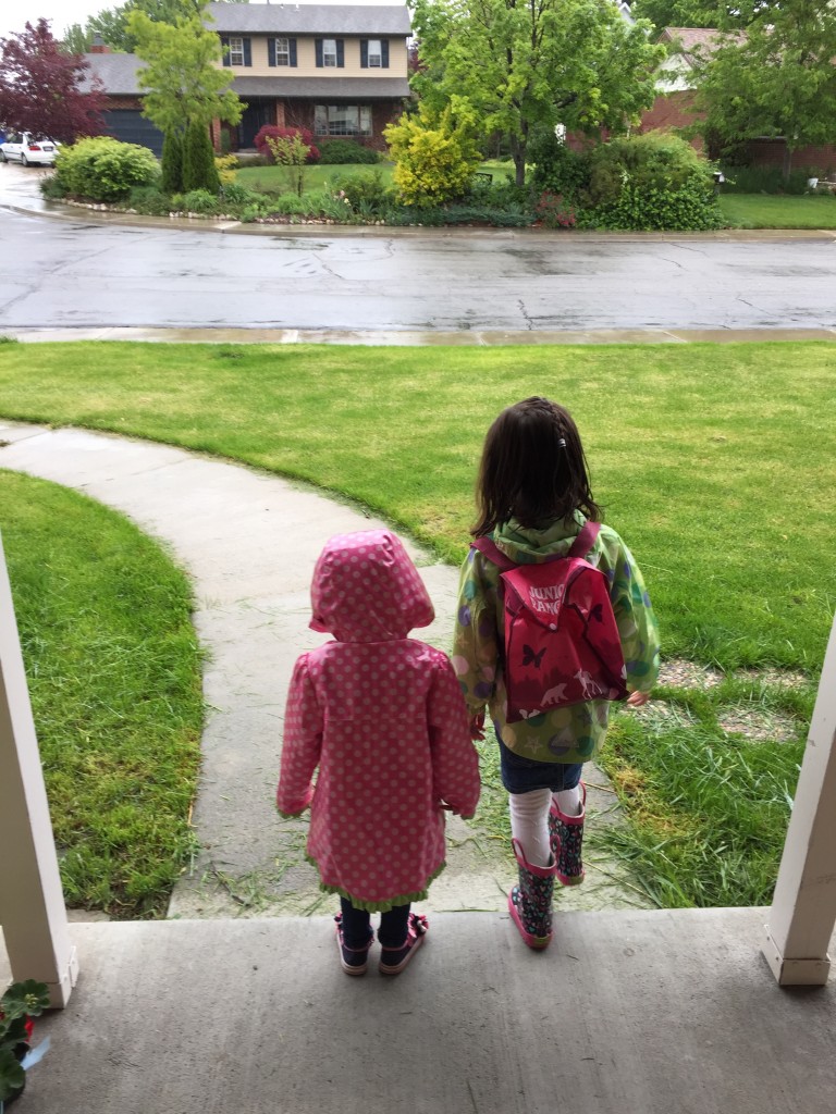 On the way to the chiropractor. The girls are entering the rainy world. 