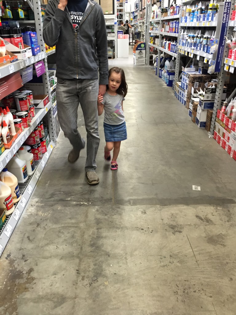 I like this picture because it looks like Lydia is doing a catwalk...while holding her daddy's hand. 