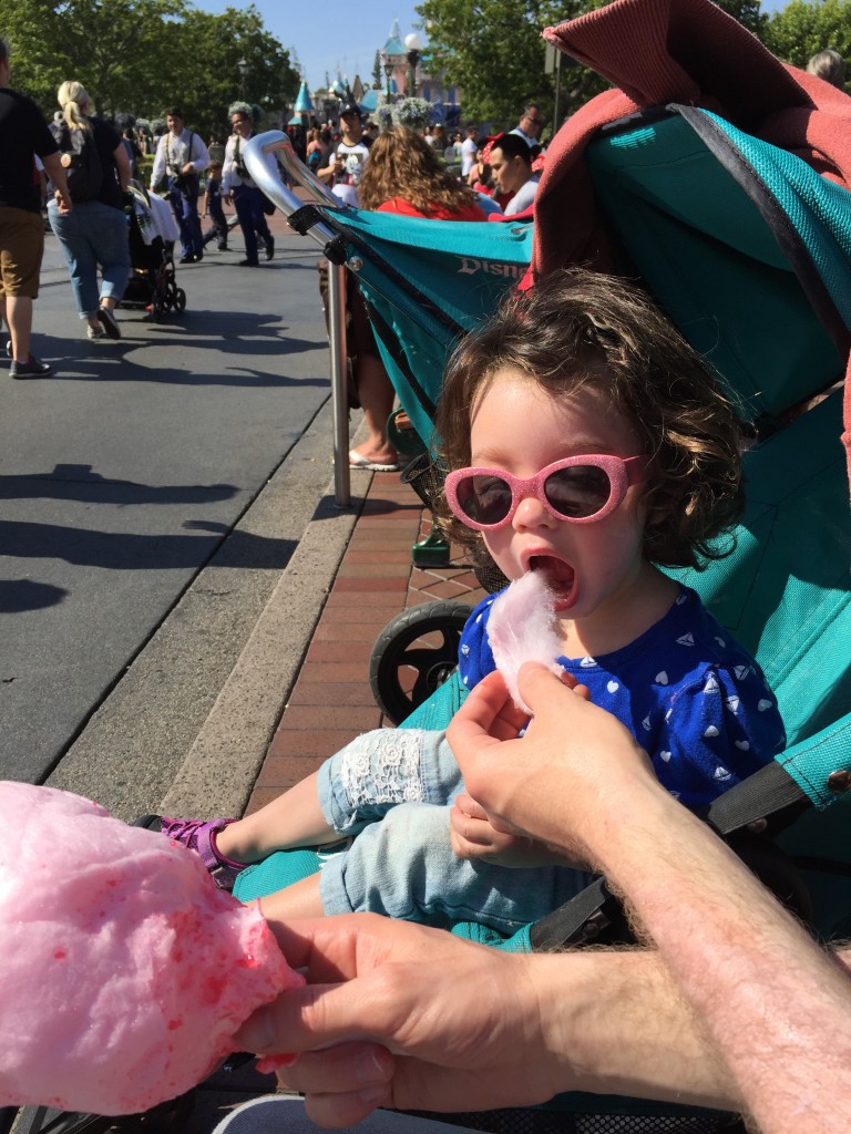 We let the girls nap in their strollers while we ate lunch and strolled around, and then we fed them cotton candy to get them going for the parade. 