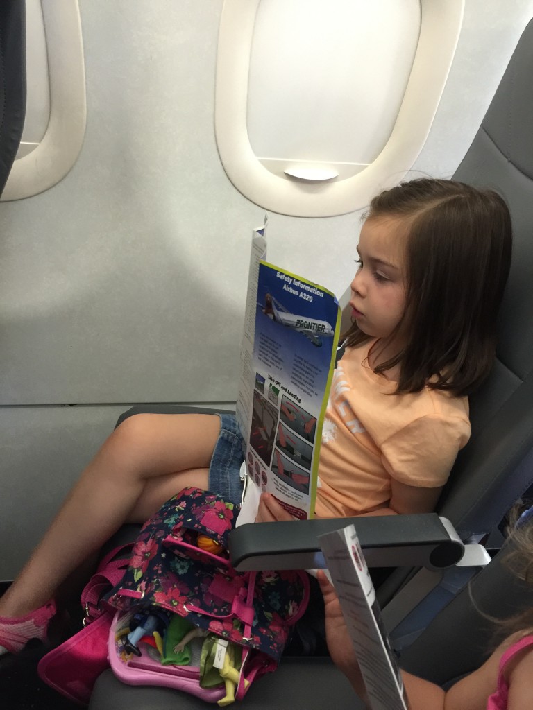 Lydia and Mary studied the safety guide on the plane. Abe took these videos of them studying the instructions, and when he reached across the aisle to show me, the flight attendants and people behind us had a good laugh. Everyone decided to consult the girls in case of emergency.