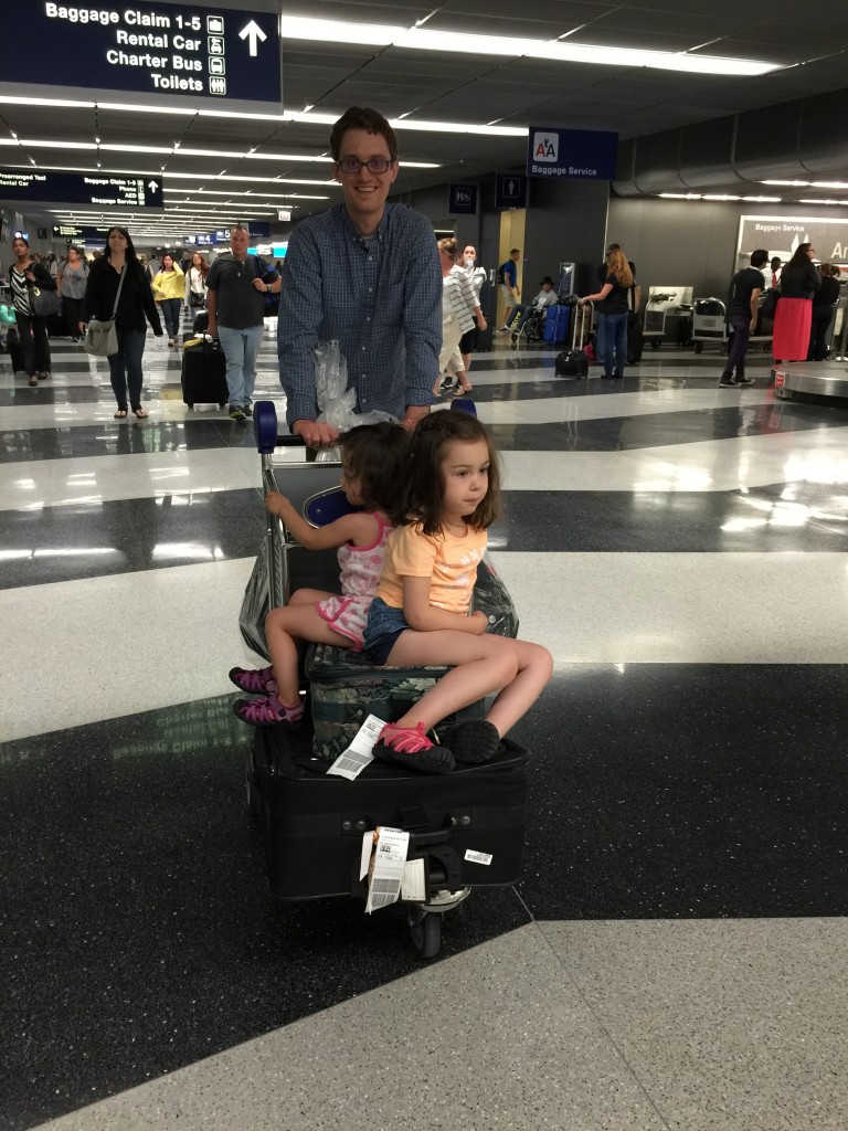 Abe thought this was a good idea. I did not. But we wheeled the kids in this fashion towards our hotel, which was actually in O'Hare airport. Lydia fell off en route. 