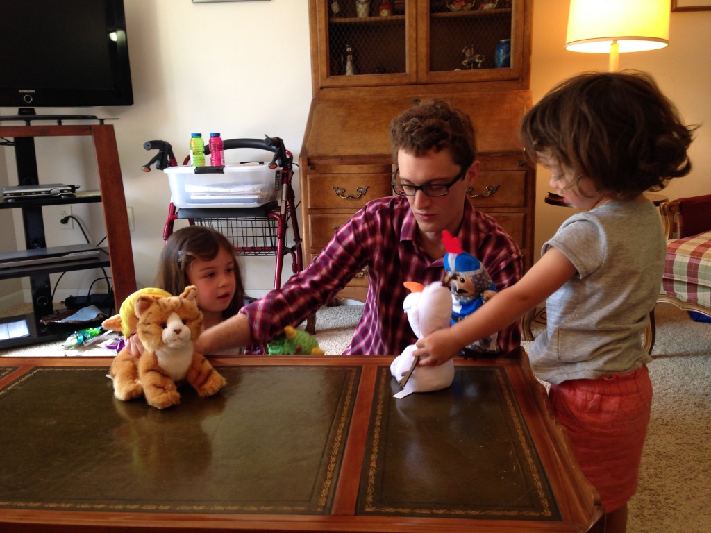 Abe and the girls put on a puppet show at Grandma's house before we went to church.