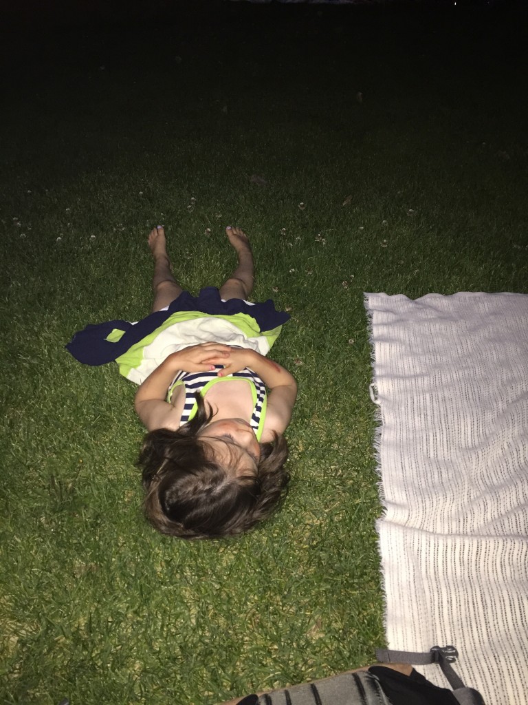 Lydia had a nosebleed, so she lay on the grass until it passed. She scooted close to me so I could drop M&M's into her mouth while she waited for the bleeding to stop. I felt like I was feeding a pet.