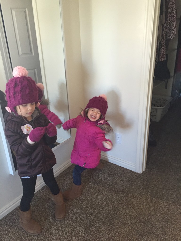 Today Abe dressed the girls warmly before taking them outside to help rake and jump in leaves.