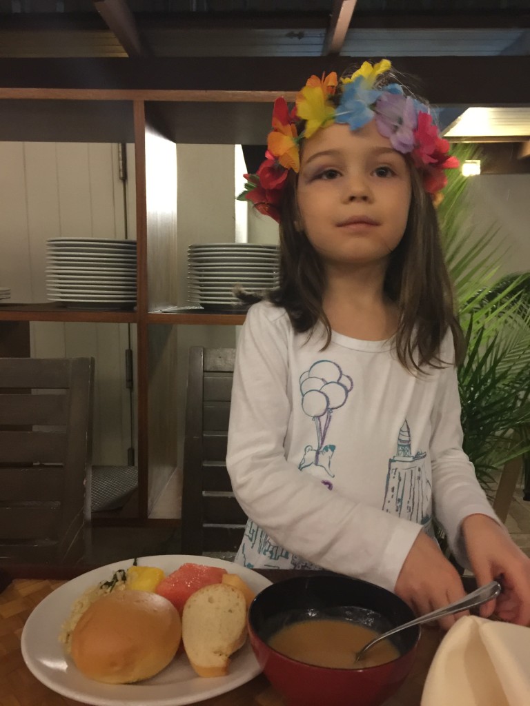 We bought the girls leis and Lydia wore hers like this. Random strangers took pictures of her, and I only hoped they ignored her black eye. She got that from falling out of her bed during a pillow fight the night before we left. Every day her eye changes color. I