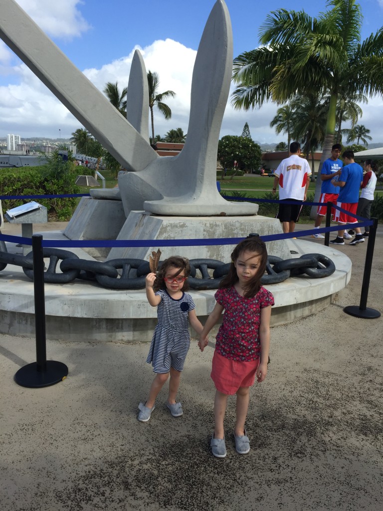 The girls liked chasing pigeons at Pearl Harbor.