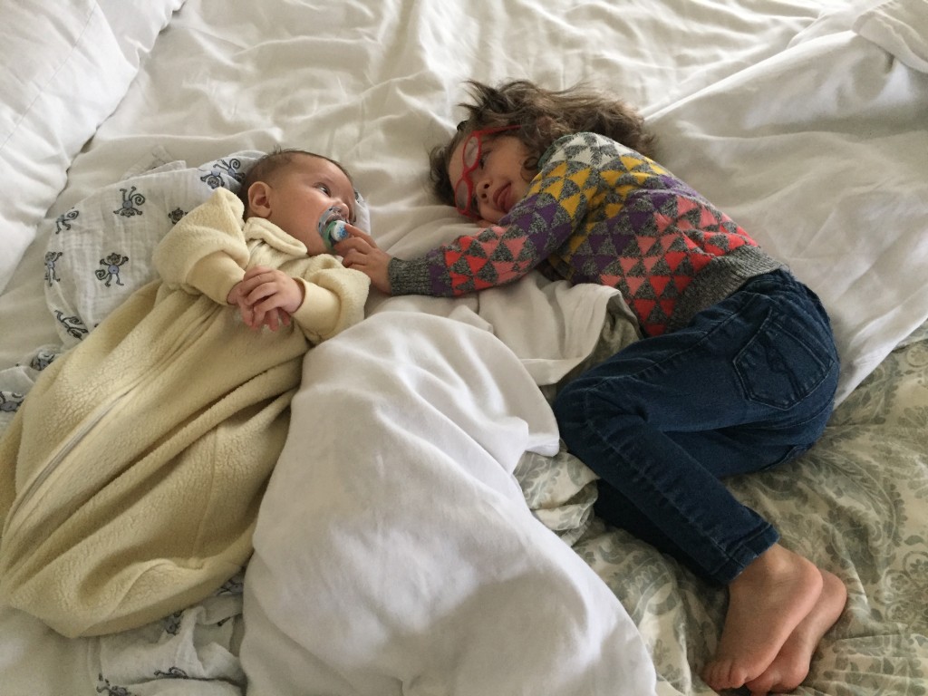Just when I started wondering if Mary had pneumonia, I found her cuddled up with Ammon on the bed. Heretofore she has shown very little interest in her baby brother. Sad, ironic timing. I'm hoping Ammon survives her affection.