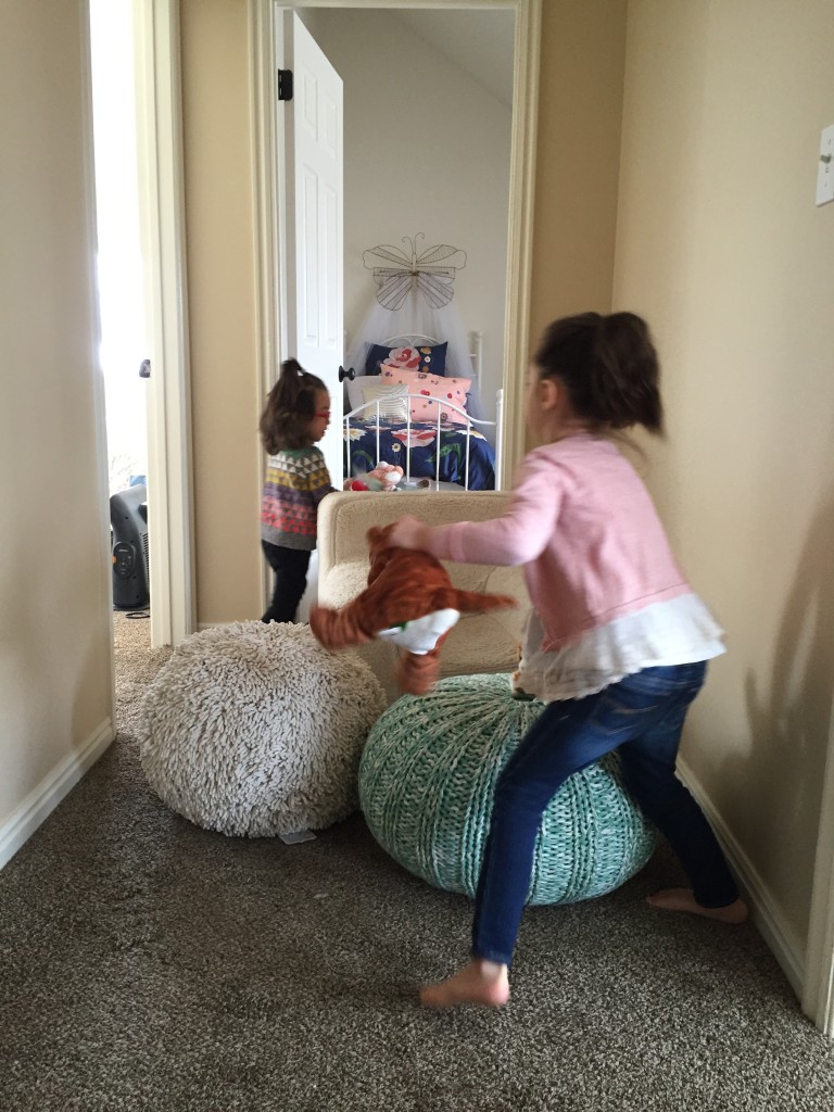 The girls were playing "musical chairs" with their stuffed animals.