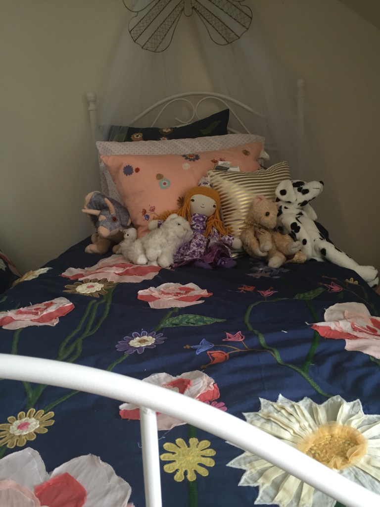 She wanted me to take pictures of "the finishing touches." (The finishing touch was adding Little Lamb to the bed.)