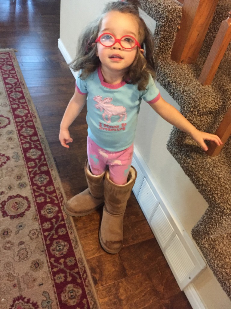 Mary is regressing in her potty training. We were really lenient the past couple days because of her surgery, Here she is wearing my boots.