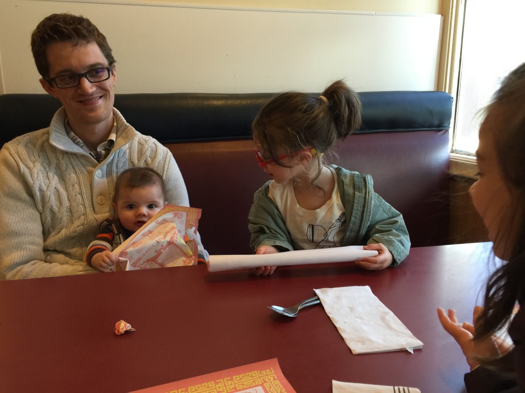 The girls were having fun calling Ammon a termite. (He was eating the paper placemat.)