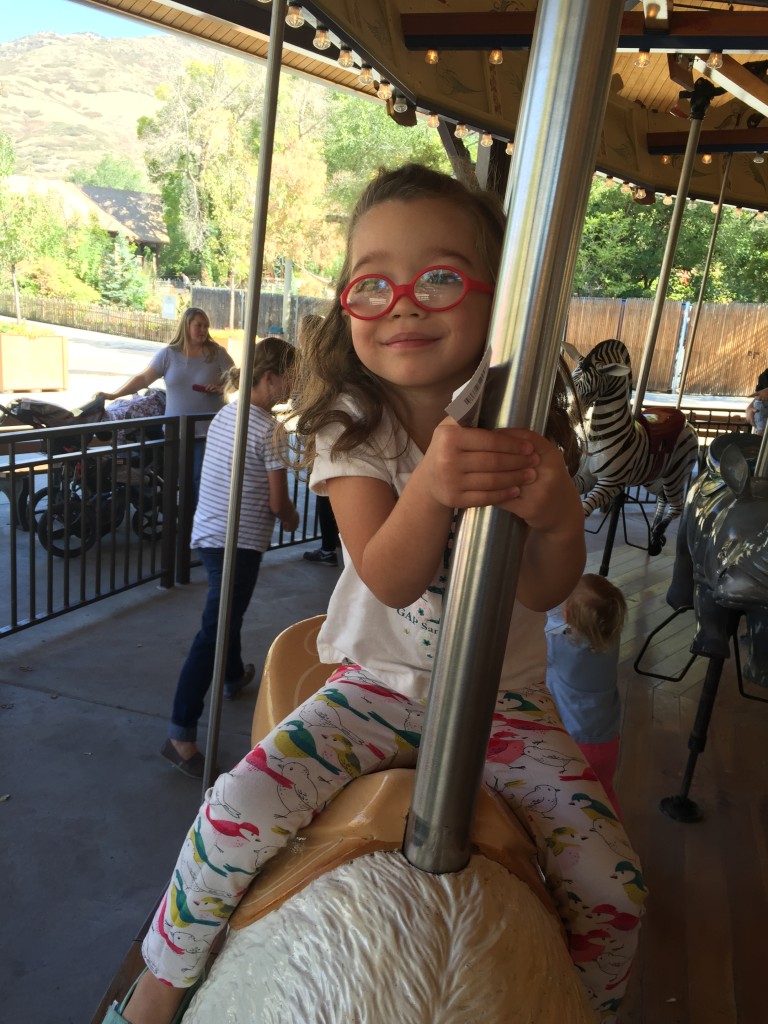 My mom's presence made it possible for me to help the girls onto their animals on the carousel. Every time we passed Ammon I would call and wave. The highlight of the ride occurred when Ammon spotted me back, pointed and grinned. My heart floated.