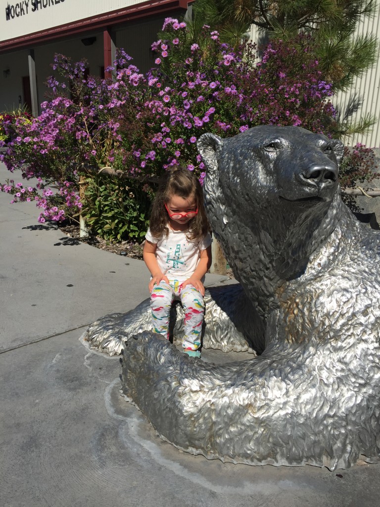 Mary sat in the bear's lap.