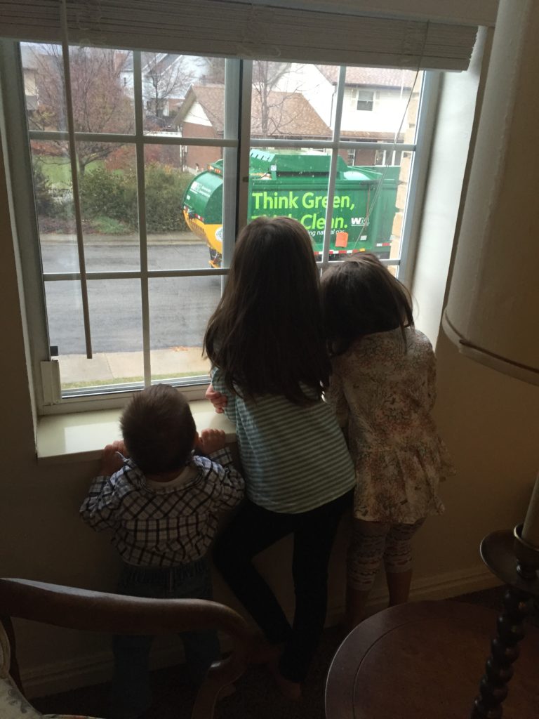 My dad taught me to love garbage trucks. When we lived in Rome, he always made a big deal about watching the garbage trucks come around, and we would cheer them on from the window. My kids are equally fascinated with this event. 