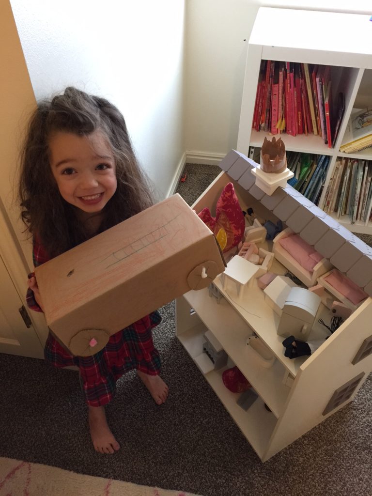 On one of her sick days, Mary and Abe made a fire truck. She then "set fire" to her doll house (with the stuffed flames you can see in the picture) and rescued her dolls with the fire truck.