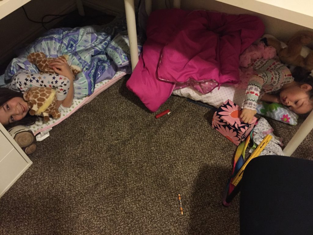 Last night the girls wanted to sleep like this. We let them, but Lydia ended up migrating to her bed because she got too hot. When I came down the stairs at 3am, I peeked in on Mary, and she was still happily under the desk.